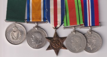 Constabulary Medal for Ireland, 2nd type, reverse (Constable E.W.G. Gurr 77189 1921)(1st 1 or 2 edge marks) British War Medal (J.50347 A.B. E.W.G. Gurr  R.N.)(fire damage) France and Germany Star, Defence Medal, War Medal Constable E.W.G. Gurr VF/GVF