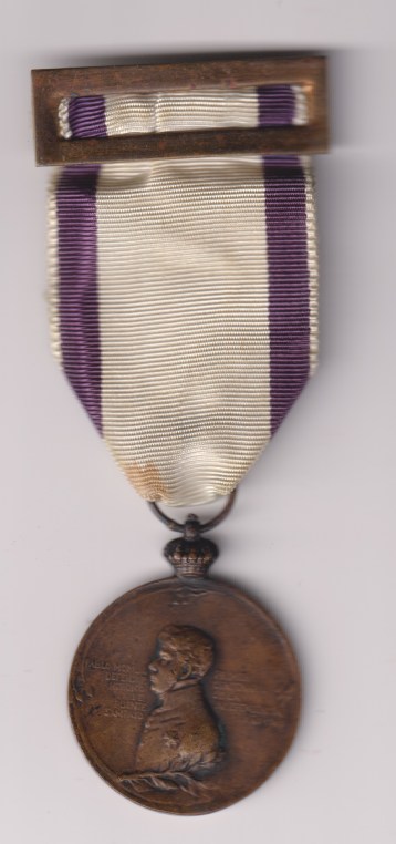 Spain defence of Puente Sampayo Centenary Medal 1809-1909, with top buckle and pin.  VF/GVF