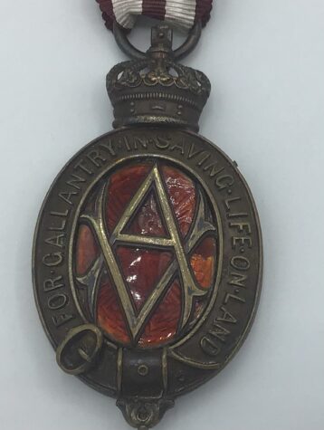 Albert Medal 2nd Class for gallantry in saving life on land in bronze, reverse officially engraved 'Presented in the name of Her Majesty to Edward David, Collier, for saving life at the Tynewydd Colliery April 1877', reverse of the crown with marker' cartouche Phillips, Cockspur St., and officially numbered 'No 31'.