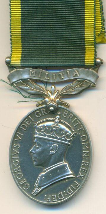 Efficiency Medal 1930, G.VI.R. 1st issue bar 'Miliitia' 5609285. Sergeant. V. Parker. Royal Military Police.  EF