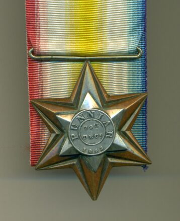 Obverse view of medal. Gwalior Campaign Star 1843. Lieutenant. A. Barnard 50th Queen’s Own Regiment. One brass nut missing from reverse