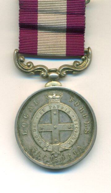Obverse view of medal. Victoria Volunteer Long and Efficient Service Medal 1881, second type, CAPTAIN WILLIAM DAVIS, RETIRED LIST, with case of issue.