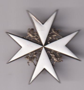 Order of St. John of Jerusalem, Knight of Grace breast star in silver and enamel.  Slight damage to point of star 11.00 GVF