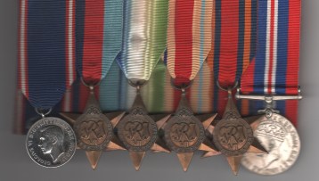 Obverse view of medals. Royal Victorian Medal George VI issue 2nd type, FID: DEF: in silver; 1939-45 Star; Atlantic Star; Africa Star; Burma Star; War Medal 1939-45. Mounted court-style for wear, contact marks.