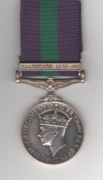 Obverse view of General Service Medal 1918-1962, 3rd issue George VI IND IMP, 1 clasp Palestine 1945-48. 14936190 Private H. C. Reynolds, Army Air Corps.