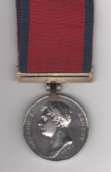 Obverse view of Waterloo Medal 1815 with original clip and replacement steel bar suspension. Henry Franks, 23rd. Regiment Foot, Royal Welch Fusiliers. Edge bruising and contact marks, edge lightly rubbed in parts. VF.