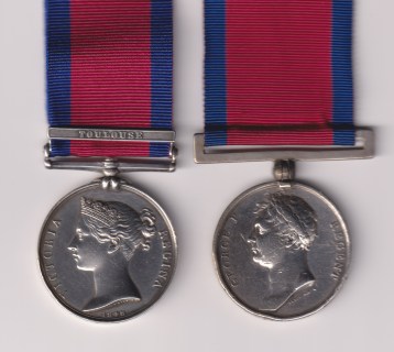 Military General Service Medal 1793-1814, 1 clasp, Toulouse (J. Adams,18th Light Dgns.); Waterloo Medal 1815, (John Adams, 18th Regiment Hussars.) with replacement silver ball and straight-bar suspension. Private J. Adams, 18th (King's Irish) Regiment of (Light) Dragoons (Hussars).  Fine/Good Fine.
