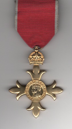 Obverse view of Most Excellent Order of the British Empire Officers O.B.E. 2nd type (civil) George GV1 on an original gilt pin.