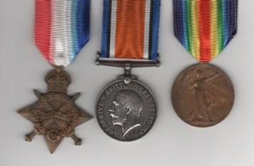 Obverse view of 1914-15 Star (P.1408. L-Cpl. W. A. Young. M.F.P.); British War Medal (P-1408 Cpl. W. A. Young. M.F.P.); Victory Medal (P-1408 Cpl. W. A. Young. M.F.P.). Corporal W. A. Young, Military Foot Police.