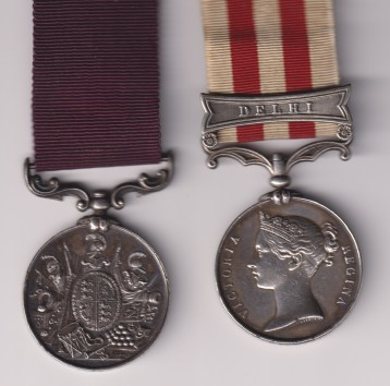 Indian Mutiny Medal 1857-1858, 1 clasp Delhi (T. T. Cavanagh 61st Regt) Army Long Service and Good Conduct Medal, Victoria issue, 3rd type 1874-1901, swivelling scroll suspension with smaller reverse lettering (93461 Segt T. Cavanagh 61st Foot.) Fine/VF