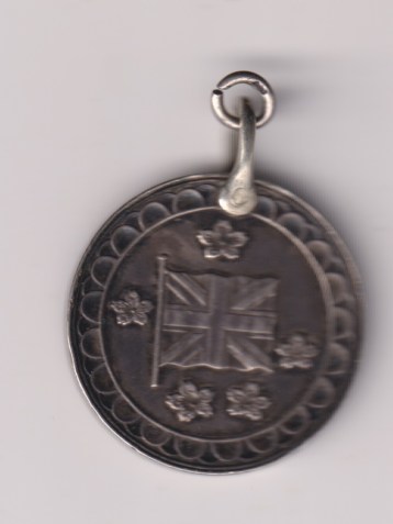 Hyogo & Ozaka, Queen Victoria Jubilee Medal 1887, 29mm, silver, the obverse featuring the Union Flag with Chrysanthemum flowers around, the reverse inscribed in raised letters, ‘Victoria Jubilee, Hyogo & Ozaka Japan 1887. EF