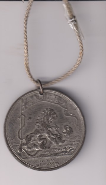 Honourable East India Company Medal for Seringapatam 1799, pewter, 48mm, Soho Mint, pierced at 12 o’clock with ring. Obverse  VF, Reverse Fair