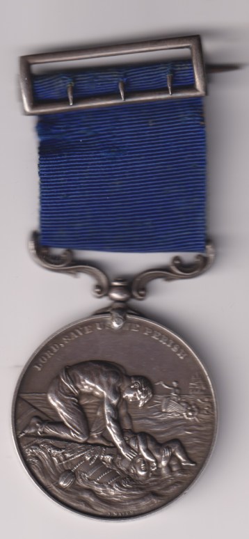 Liverpool Shipwreck and Humane Society's Marine Medal 3rd type, post 1874 issue in silver, on a 3 prong top ribbon bar,'Captain William Forsyth S.S. Idaho for Humanity in Rescuing Crew of Schooner Britton on January 15 1875'. GVF