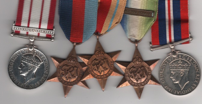 1939-45 Star; Atlantic Star, 1 clasp, France and Germany; Africa Star; War Medal, Naval General Service 1915-62, 2nd issue George V1 INDIAE IMP: 1 clasp, Palestine 1936-1939 (Paymr. Mid. M. Rogers. R.N) Paymaster Lieutenant M. Rogers, Royal Navy.