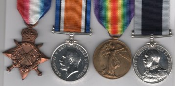 1914-15 Star (218608, J. Thomas, A.B., R.N.); British War and Victory Medals (218608 J. Thomas. A.B. R.N.); Royal Navy Long Service and Good Conduct, George V, 1st type Admirals bust, 1911-1930 (218608 John Thomas, A.B. H.M.S. Erin.) Able Seaman J. Thomas, Royal Navy H.M.S. Erin. GVF.