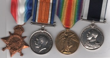 1914-15 Star (Ply.12955, Pte. J. Redwood, R.M.L.I.); British War Medal, Victory Medal (Ply.12955 Pte. J. Redwood. R.M.L.I.); Royal Navy Long Service and Good Conduct  George V, 1st type Admirals bust, 1911-1930 (Ply/12955. Jesse Redwood, Private. R.M.L.I.) Ply/12955 Private J. Redwood, Royal Marine Light Infantry.  EF