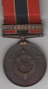 National Fire Brigades Association Medal, 2nd type, bronze, Ten years, with bar ‘Ten Years’, 10858 Herbert Ward.  GVF