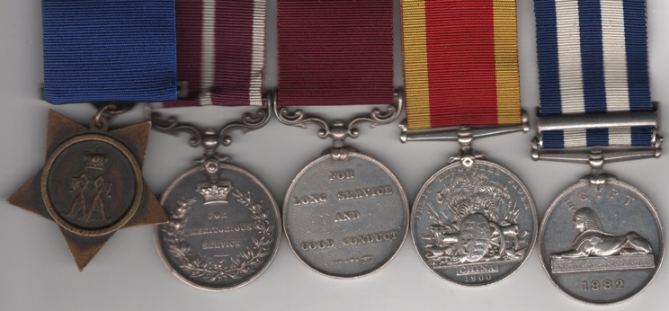 Egypt Medal 1882-1889 (Dated 1882), 1 clasp, Tel-El-Kebir (12260. Gunr. T. Morgan. I/2 Bde. R.A.); China War Medal 1900 no clasp (12260 Staff Sergt. Farrier T. Morgan B By. R.H.A.); F.A); Army Long Service and Good Conduct Medal Victoria issue, 3rd type 1874-1901, swiveling scroll suspension with smaller reverse lettering (12260. St: S: Farr: T. Morgan) (unit indistinct) Army Meritorious Service Medal, G.V.R., 1st issue (49407 Far: Q.M. Sjt. T. Morgan. R.F.A.); Khedive’s Star, dated 1882. 12260 Farrier Quartermaster-Sergeant T. Morgan, Royal Artillery. Fine to EF - Image 2