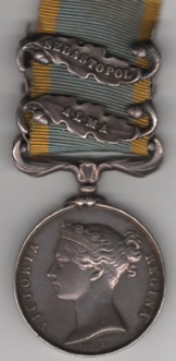 Crimea 1854-56, officially impressed, 2 clasps, Alma, Sebastopol.  Gunner & Driver W. Crainey, 11th battalion Royal Artillery.  VF