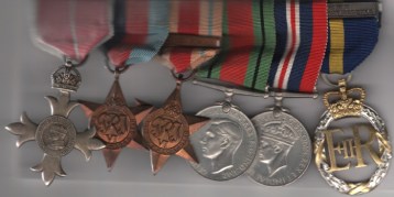 The Most Excellent Order of the British Empire, M.B.E. (Military) Member’s 2nd type, breast badge; 1939-45 Star; Africa Star, 1 clasp, 8th Army; Defence Medal, War Medal, Efficiency Decoration, E.II.R., reverse officially dated 1954, with Army Emergency Reserve top ribbon bar, mounted as worn.  GVF/EF