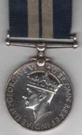 Distinguished Service Medal, G.VI.R.  Able Seaman E. W. Manion, Royal Navy. On an original pin EF