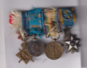 1915-15 Star, British War Medal, Victory Medal, M.I.D. oakleaf, Order of the Nile, Egypt, 4th class rosette on ribbon. Mounted on a Spink Piccadilly bar, fragile original ribbons (hanging on by a thread) sold with a set of new ribbons.  VF/GVF