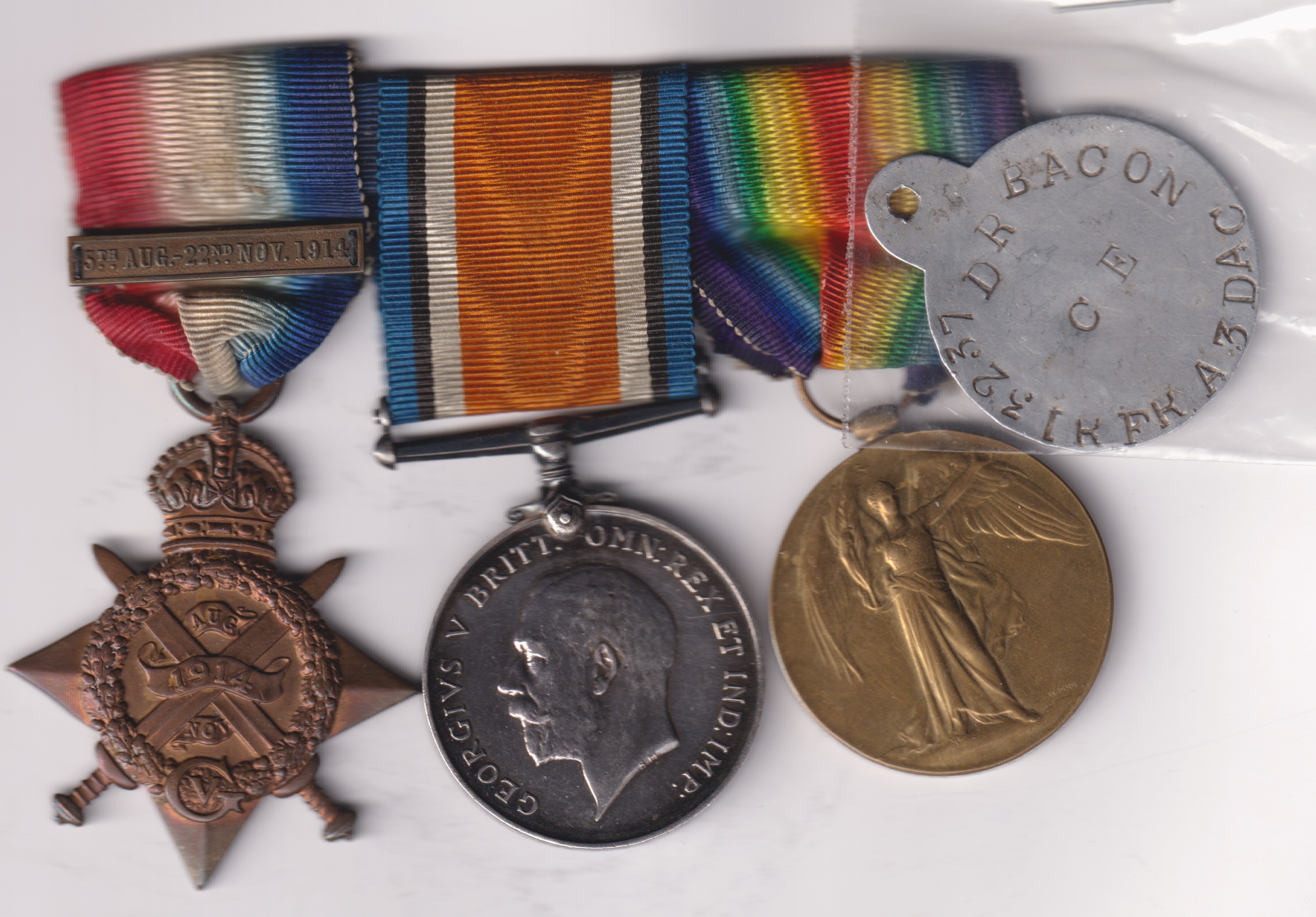 1914 Star with original Mons clasp (13237 Dvr. S.J. Bacon R.F.A.) British War Medal, Victory Medal (13237 Dvr. S.J. Bacon R.A.) 13237 Driver S.J. Bacon Royal Artillery EF