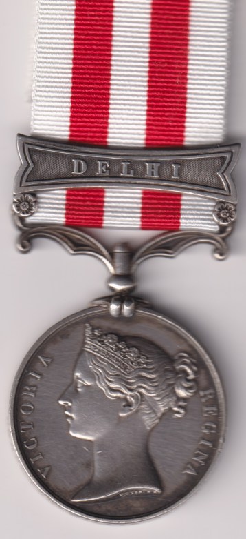 Indian Mutiny Medal, 1857‑58, one clasp Delhi,  Corporal Thomas Wills, 75th (Stirlingshire) Regiment of Foot. GVF/EF