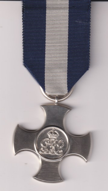 Distinguished Service Cross, George V. hallmark 1920,  on an original pin. EF