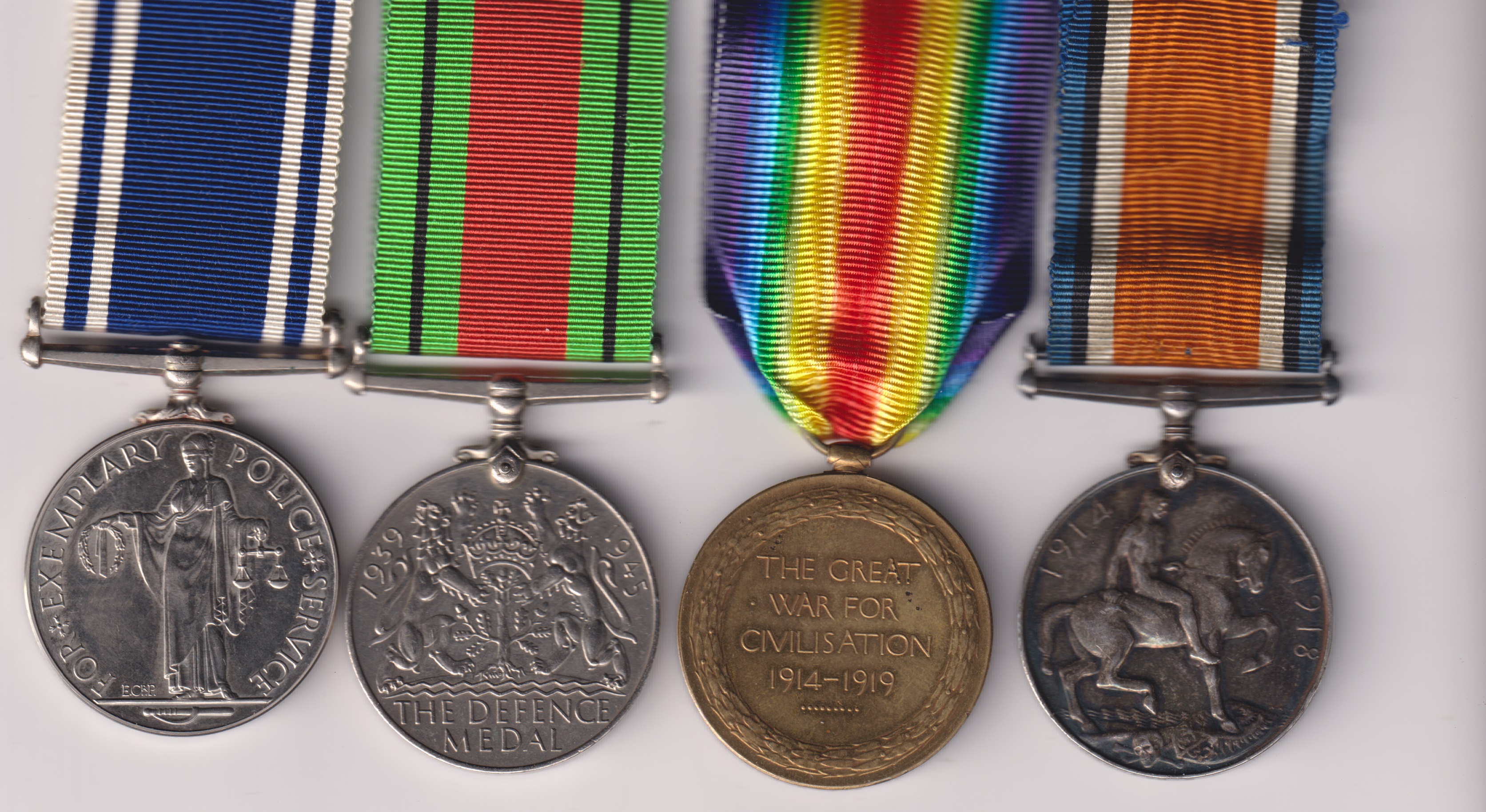 British War Medal, Victory Medal (251924 3.A.M. W.E. Rynolds R.A.F.) Defence Medal, Police Long Service and Good Conduct Medal 1951, George VI issue, (Inspr. William E. Reynolds). 251924 Aircraftman 3rd Class W.E. Rynolds Royal Air Force /Police . EF - Image 4
