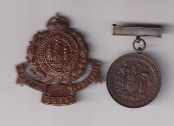 Special Constabulary 1916 Birmingham City Police numbered on the lower scroll B.W. 252 with original pin. Medal Birmingham Corporation Waterworks Guard Special Constabulary 1917-18 with original pin. Sold with a sepia postcard undated but numbered 91 on the bottom of the picture of a Special Constable carrying a revolver.   EF