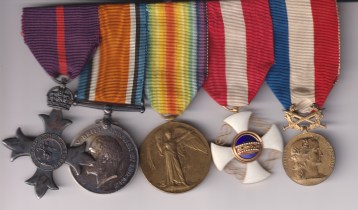 The Most Excellent Order of the British Empire, M.B.E. (Military) Member’s 1st type breast badge, silver, hallmarks for London 1919; British War Medal, Victory Medal (2. Lieut. J. G. Barraclough.); Italy, Kingdom, Order of the Crown, Fifth Class breast badge, gold and enamel, unmarked; France, Third Republic, Medal of Honour, with Swords, in ‘Gold’, silver-gilt. Lieutenant J. G. Barraclough Royal Fusiliers.  EF/GVF