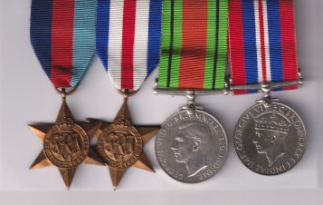 1939-45 Star, France and Germany Star, Defence Medal, War Medal, unnamed WW2 group mounted swing style for wear. EF